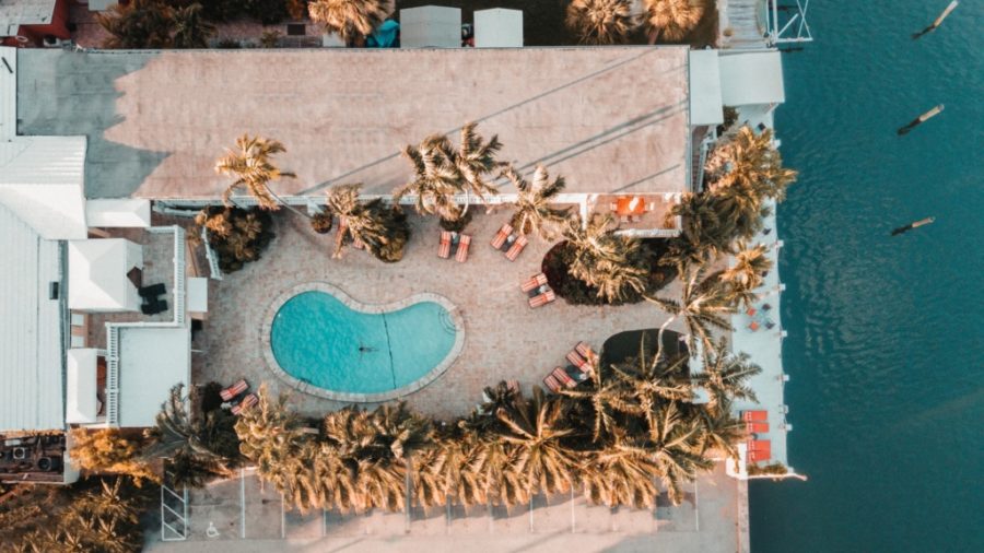 Aerial drone photography of swimming pool in hotel